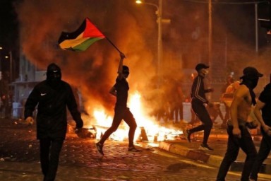 إسرائيل تعلن الحرب على العلم الفلسطيني في أراضي48