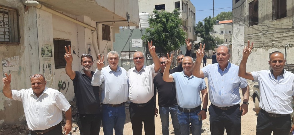 وفد من المتابعة يزور مخيم جنين ويعلن عن تنظيم حملات لإغاثة المخيم