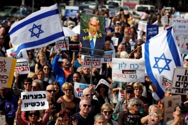 آلاف الإسرائيليين يتظاهرون بالقرب من الكنيست للمطالبة بإجراء انتخابات